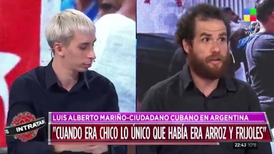 Del Pópolo (i) y Mariño (d) durante su debate.