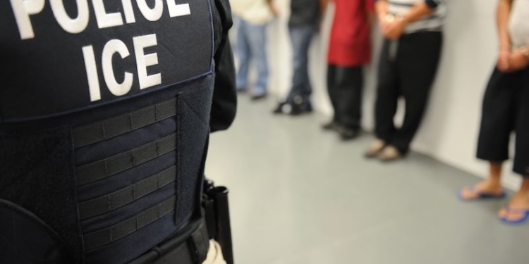 ICE ERO arrested more than 3,100 convicted criminal aliens, fugitives and immigration violators in a six-day nationwide enforcement action. In this photo an UCE agents watch over arrestees in Miami.